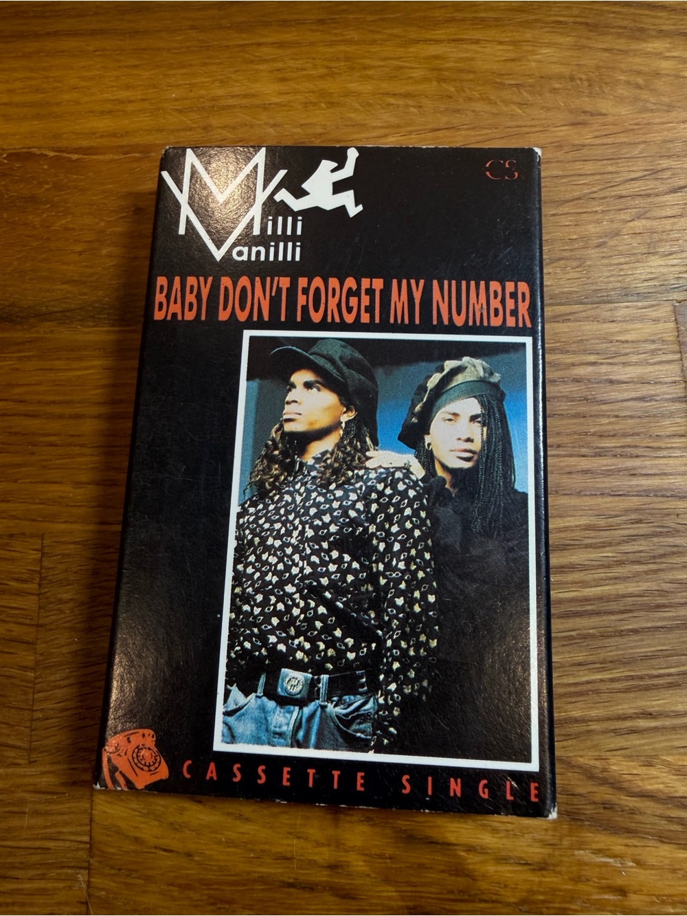 Milli Vanilli "Baby Don't Forget My Number" Cassette Single - Black & Orange